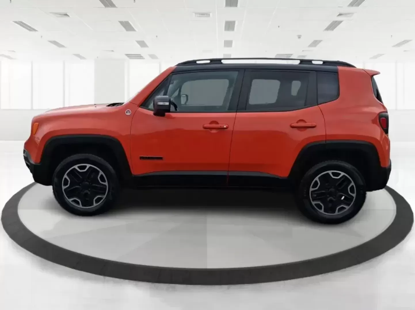2016 Jeep Renegade Trailhawk (ZACCJBCT5GP) with an Tigershark MultiAir 2.4L I-4 variable valve contro engine, 9A transmission, located at 8750 N County Rd 25A, Piqua, OH, 45356, (937) 908-9800, 40.164391, -84.232513 - Weekend escapes, snowy commutes, and everyday errands feel easier when your crossover is ready for whatever Ohio throws your way. This **2016 Jeep Renegade Trailhawk** in eye-catching **Omaha Orange** is built for drivers who want real capability in a city-friendly size-perfect for exploring MetroPa - Photo#5