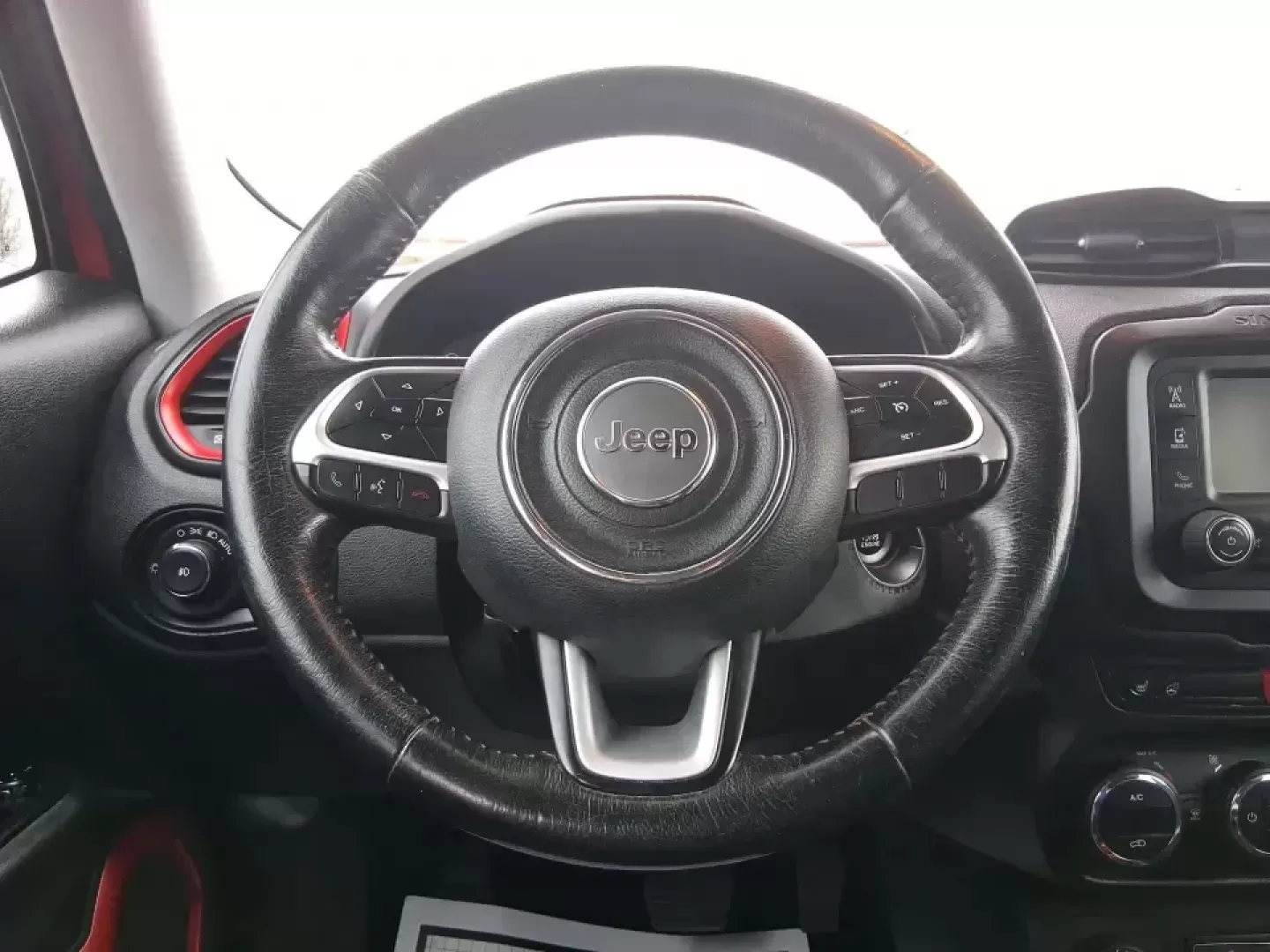 2016 Jeep Renegade Trailhawk (ZACCJBCT5GP) with an Tigershark MultiAir 2.4L I-4 variable valve contro engine, 9A transmission, located at 8750 N County Rd 25A, Piqua, OH, 45356, (937) 908-9800, 40.164391, -84.232513 - Weekend escapes, snowy commutes, and everyday errands feel easier when your crossover is ready for whatever Ohio throws your way. This **2016 Jeep Renegade Trailhawk** in eye-catching **Omaha Orange** is built for drivers who want real capability in a city-friendly size-perfect for exploring MetroPa - Photo#16