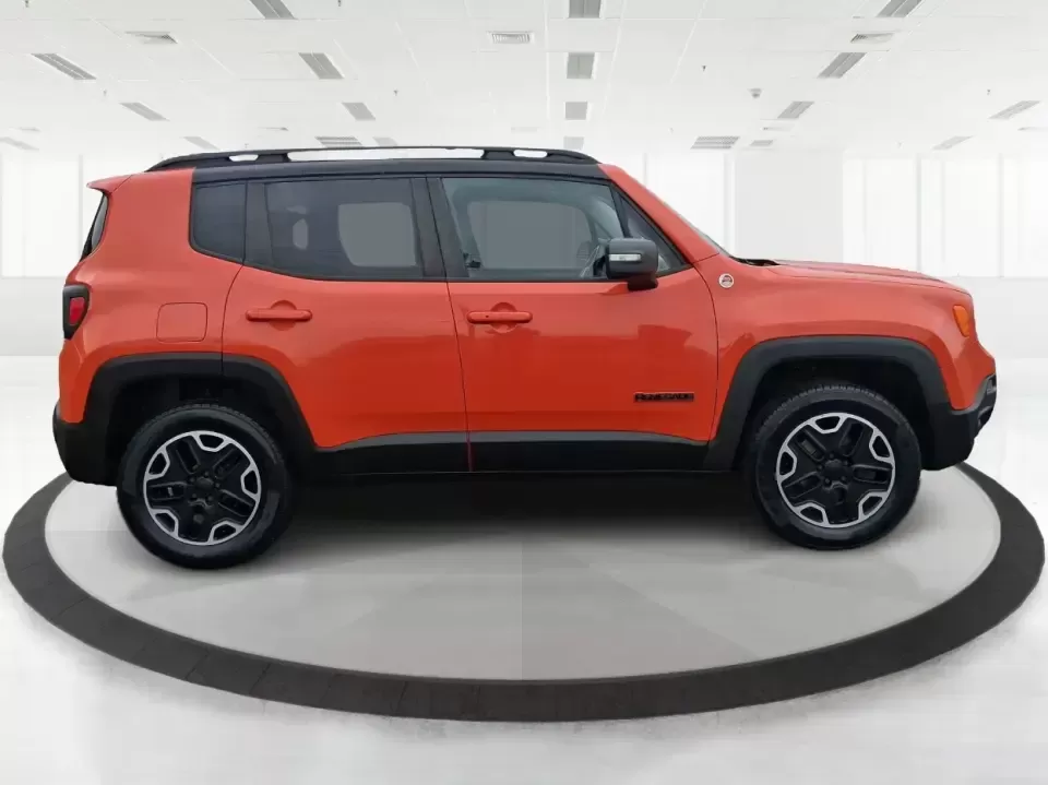 2016 Jeep Renegade Trailhawk (ZACCJBCT5GP) with an Tigershark MultiAir 2.4L I-4 variable valve contro engine, 9A transmission, located at 4508 South Dixie Dr, Moraine, OH, 45439, (937) 908-9800, 39.689976, -84.218452 - Weekend escapes, snowy commutes, and everyday errands feel easier when your crossover is ready for whatever Ohio throws your way. This **2016 Jeep Renegade Trailhawk** in eye-catching **Omaha Orange** is built for drivers who want real capability in a city-friendly size-perfect for exploring MetroPa - Photo#1