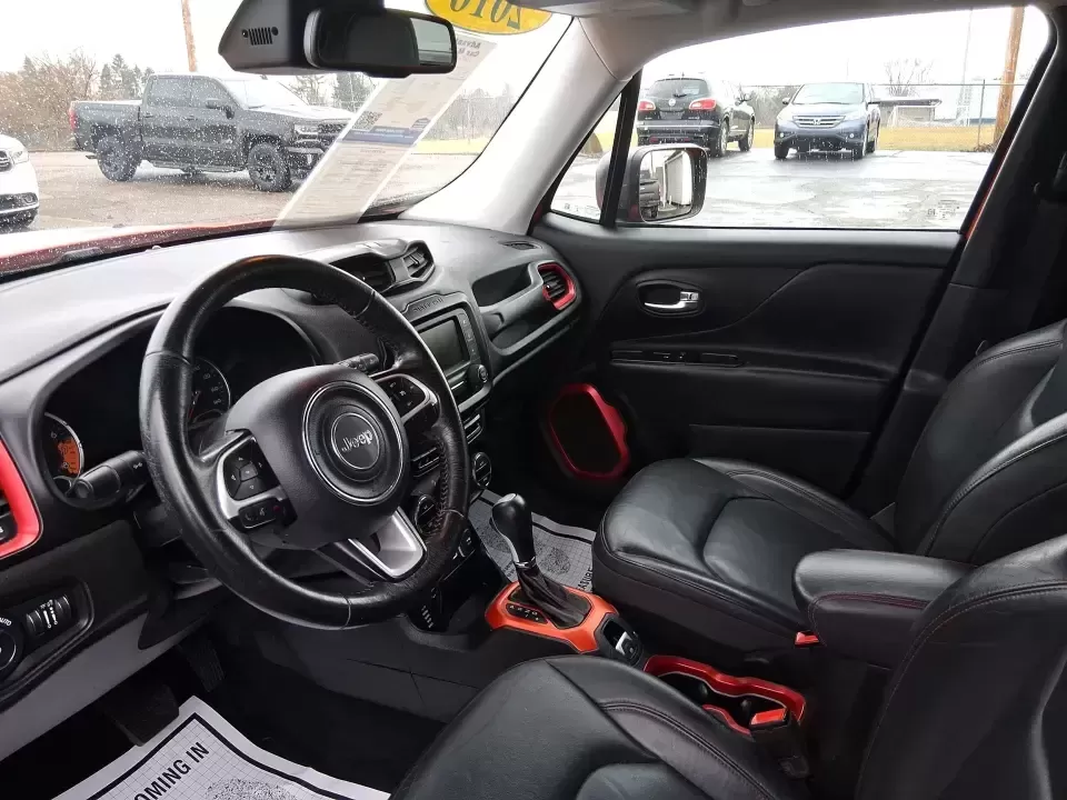 2016 Jeep Renegade Trailhawk (ZACCJBCT5GP) with an Tigershark MultiAir 2.4L I-4 variable valve contro engine, 9A transmission, located at 4508 South Dixie Dr, Moraine, OH, 45439, (937) 908-9800, 39.689976, -84.218452 - Weekend escapes, snowy commutes, and everyday errands feel easier when your crossover is ready for whatever Ohio throws your way. This **2016 Jeep Renegade Trailhawk** in eye-catching **Omaha Orange** is built for drivers who want real capability in a city-friendly size-perfect for exploring MetroPa - Photo#9