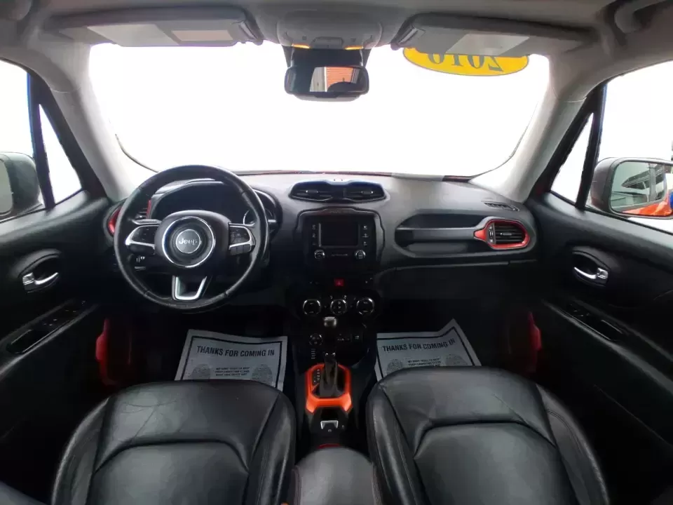 2016 Jeep Renegade Trailhawk (ZACCJBCT5GP) with an Tigershark MultiAir 2.4L I-4 variable valve contro engine, 9A transmission, located at 4508 South Dixie Dr, Moraine, OH, 45439, (937) 908-9800, 39.689976, -84.218452 - Weekend escapes, snowy commutes, and everyday errands feel easier when your crossover is ready for whatever Ohio throws your way. This **2016 Jeep Renegade Trailhawk** in eye-catching **Omaha Orange** is built for drivers who want real capability in a city-friendly size-perfect for exploring MetroPa - Photo#21