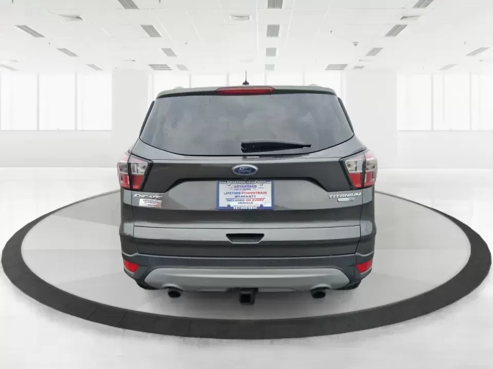 2017 Ford Escape Titanium (1FMCU9J94HU) with an 2.0L L4 DOHC 16V engine, 6A transmission, located at 1951 S Dayton Lakeview Rd., New Carlisle, OH, 45344, (937) 908-9800, 39.890999, -84.050255 - Pack the gear, load up the family, and point the GPS toward your next weekend escape-this 2017 Ford Escape Titanium is the kind of compact SUV that fits real life in Piqua. Whether you're commuting up I75, running errands along N County Rd 25A, or planning a day trip to Lock 9 Park and the Great Mia - Photo#3