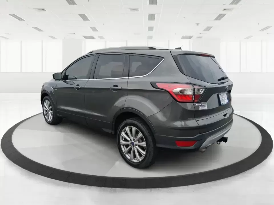 2017 Ford Escape Titanium (1FMCU9J94HU) with an 2.0L L4 DOHC 16V engine, 6A transmission, located at 1951 S Dayton Lakeview Rd., New Carlisle, OH, 45344, (937) 908-9800, 39.890999, -84.050255 - Pack the gear, load up the family, and point the GPS toward your next weekend escape-this 2017 Ford Escape Titanium is the kind of compact SUV that fits real life in Piqua. Whether you're commuting up I75, running errands along N County Rd 25A, or planning a day trip to Lock 9 Park and the Great Mia - Photo#4