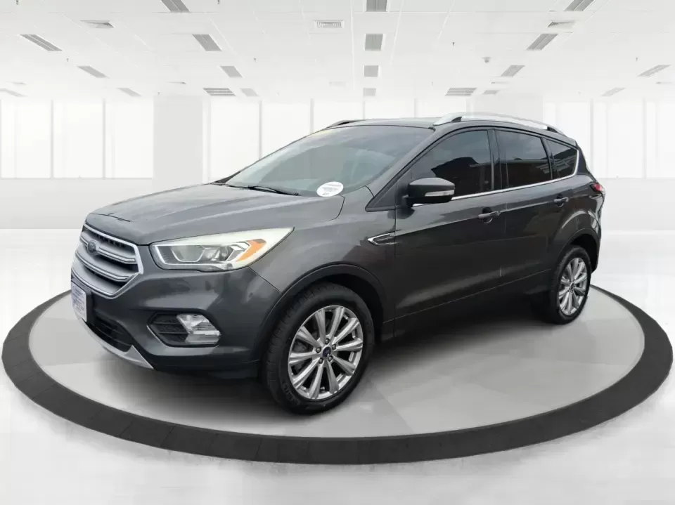 2017 Ford Escape Titanium (1FMCU9J94HU) with an 2.0L L4 DOHC 16V engine, 6A transmission, located at 1951 S Dayton Lakeview Rd., New Carlisle, OH, 45344, (937) 908-9800, 39.890999, -84.050255 - Pack the gear, load up the family, and point the GPS toward your next weekend escape-this 2017 Ford Escape Titanium is the kind of compact SUV that fits real life in Piqua. Whether you're commuting up I75, running errands along N County Rd 25A, or planning a day trip to Lock 9 Park and the Great Mia - Photo#8