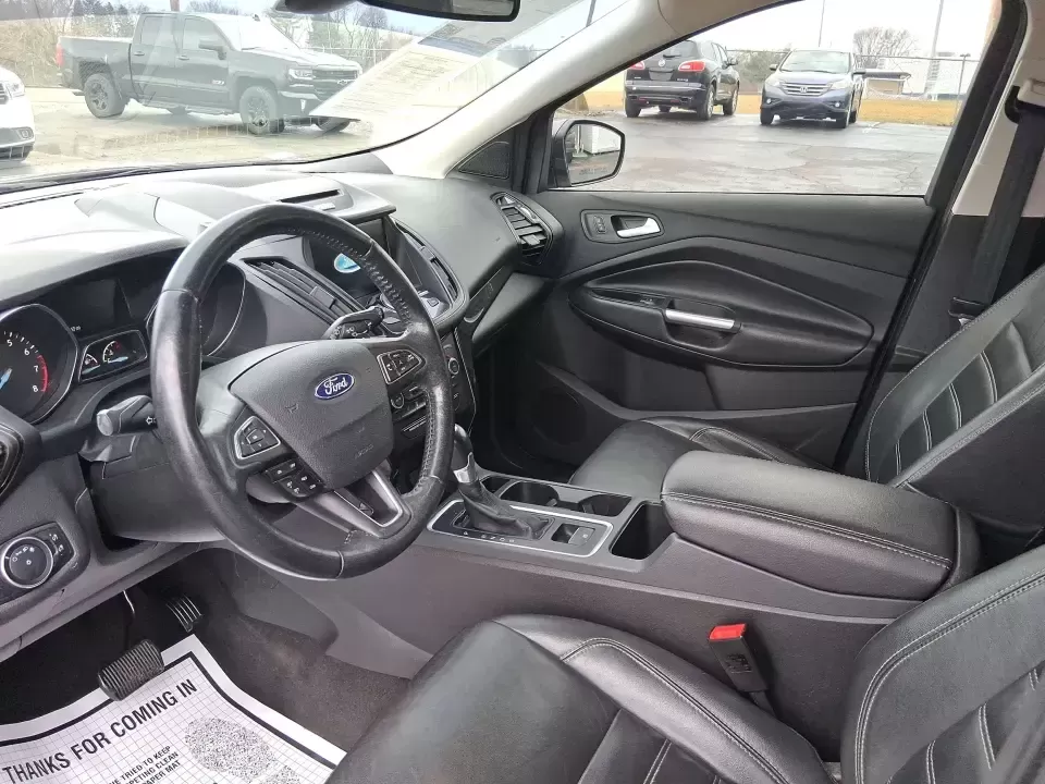 2017 Ford Escape Titanium (1FMCU9J94HU) with an 2.0L L4 DOHC 16V engine, 6A transmission, located at 1951 S Dayton Lakeview Rd., New Carlisle, OH, 45344, (937) 908-9800, 39.890999, -84.050255 - Pack the gear, load up the family, and point the GPS toward your next weekend escape-this 2017 Ford Escape Titanium is the kind of compact SUV that fits real life in Piqua. Whether you're commuting up I75, running errands along N County Rd 25A, or planning a day trip to Lock 9 Park and the Great Mia - Photo#9