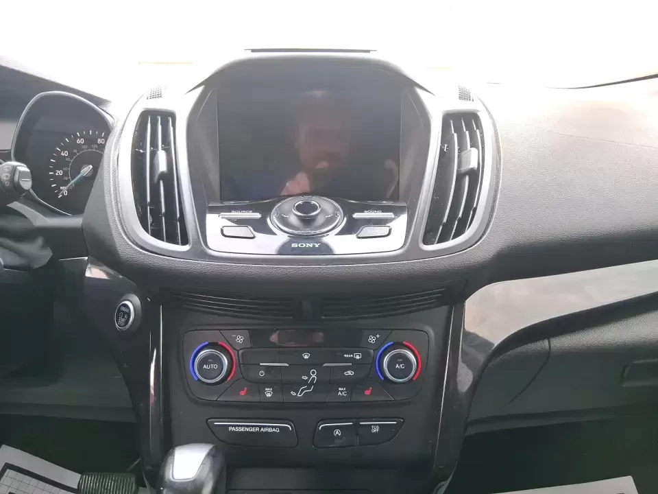 2017 Ford Escape Titanium (1FMCU9J94HU) with an 2.0L L4 DOHC 16V engine, 6A transmission, located at 1951 S Dayton Lakeview Rd., New Carlisle, OH, 45344, (937) 908-9800, 39.890999, -84.050255 - Pack the gear, load up the family, and point the GPS toward your next weekend escape-this 2017 Ford Escape Titanium is the kind of compact SUV that fits real life in Piqua. Whether you're commuting up I75, running errands along N County Rd 25A, or planning a day trip to Lock 9 Park and the Great Mia - Photo#13