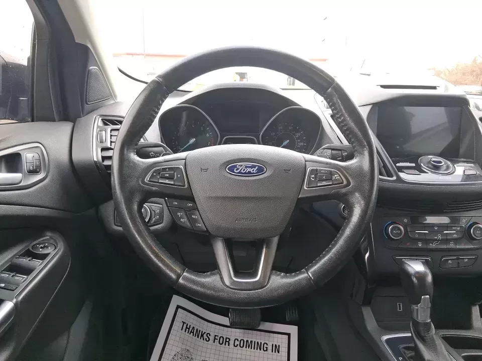2017 Ford Escape Titanium (1FMCU9J94HU) with an 2.0L L4 DOHC 16V engine, 6A transmission, located at 1951 S Dayton Lakeview Rd., New Carlisle, OH, 45344, (937) 908-9800, 39.890999, -84.050255 - Pack the gear, load up the family, and point the GPS toward your next weekend escape-this 2017 Ford Escape Titanium is the kind of compact SUV that fits real life in Piqua. Whether you're commuting up I75, running errands along N County Rd 25A, or planning a day trip to Lock 9 Park and the Great Mia - Photo#16