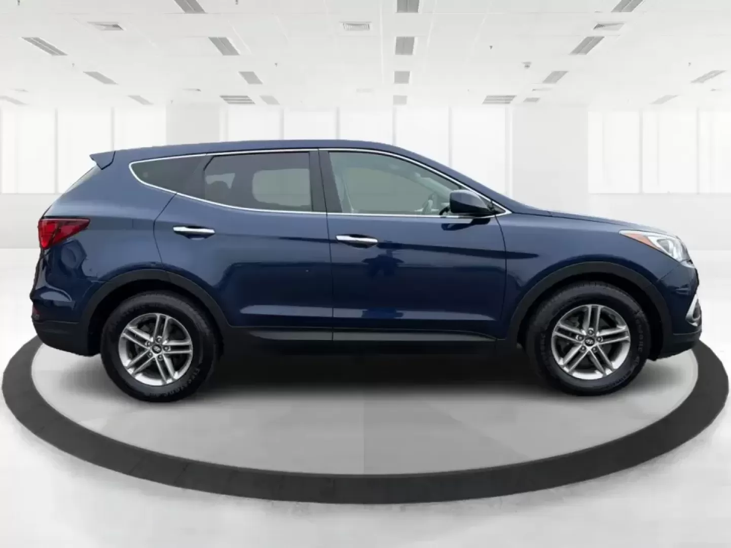 2018 Hyundai Santa Fe 2.4L (5XYZTDLB6JG) with an Theta II 2.4L I-4 gasoline direct injection engine, 6A transmission, located at 8750 N County Rd 25A, Piqua, OH, 45356, (937) 908-9800, 40.164391, -84.232513 - Road trips to Indian Lake, snowy school runs, and everyday commuting up and down I75 feel a lot easier when your SUV is roomy, confident in bad weather, and comfortable for everyone on board. This 2018 Hyundai Santa Fe 2.4L in striking Nightfall Blue is a practical, family-friendly sport utility tha - Photo#1