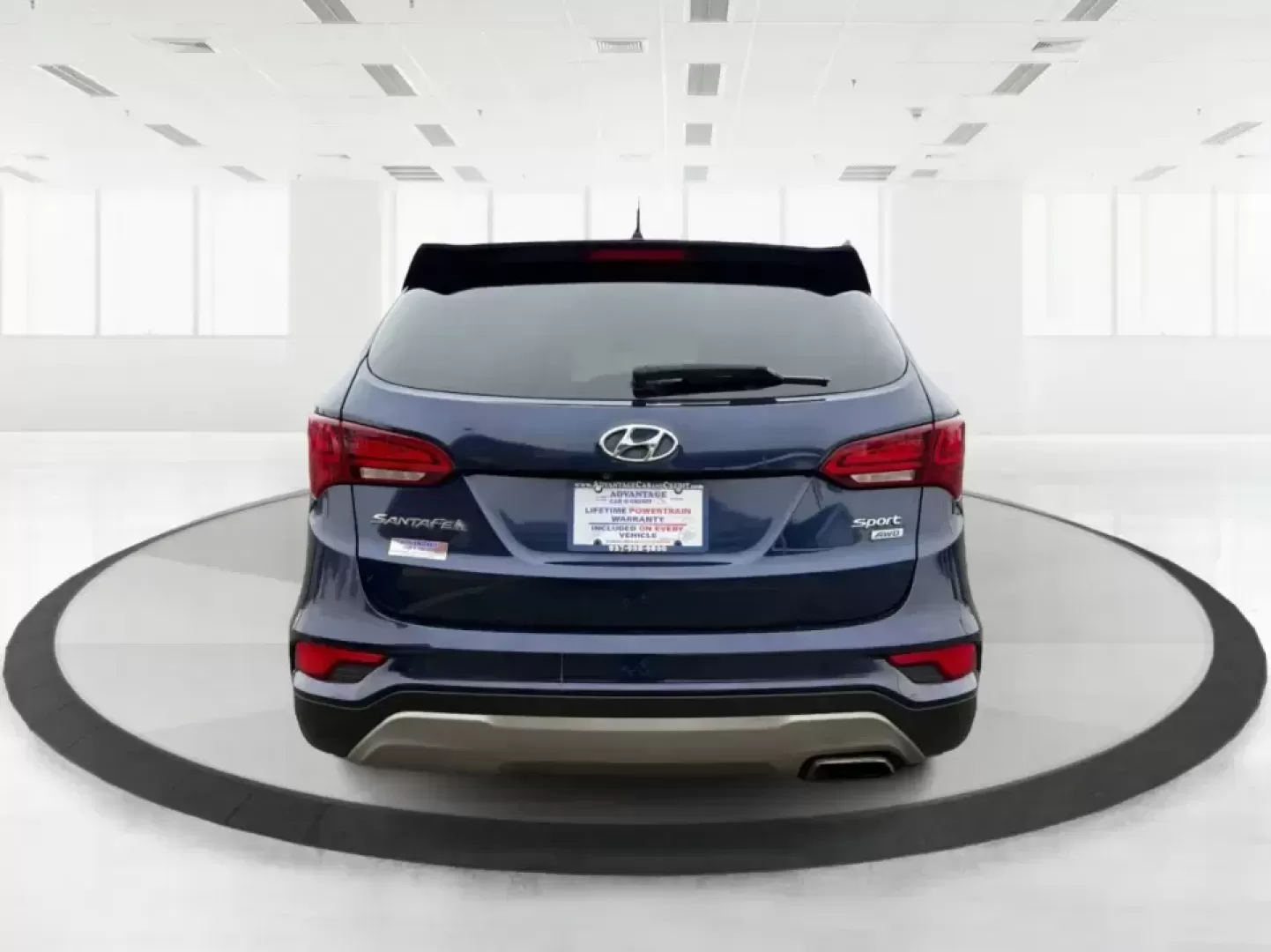 2018 Hyundai Santa Fe 2.4L (5XYZTDLB6JG) with an Theta II 2.4L I-4 gasoline direct injection engine, 6A transmission, located at 8750 N County Rd 25A, Piqua, OH, 45356, (937) 908-9800, 40.164391, -84.232513 - Road trips to Indian Lake, snowy school runs, and everyday commuting up and down I75 feel a lot easier when your SUV is roomy, confident in bad weather, and comfortable for everyone on board. This 2018 Hyundai Santa Fe 2.4L in striking Nightfall Blue is a practical, family-friendly sport utility tha - Photo#3