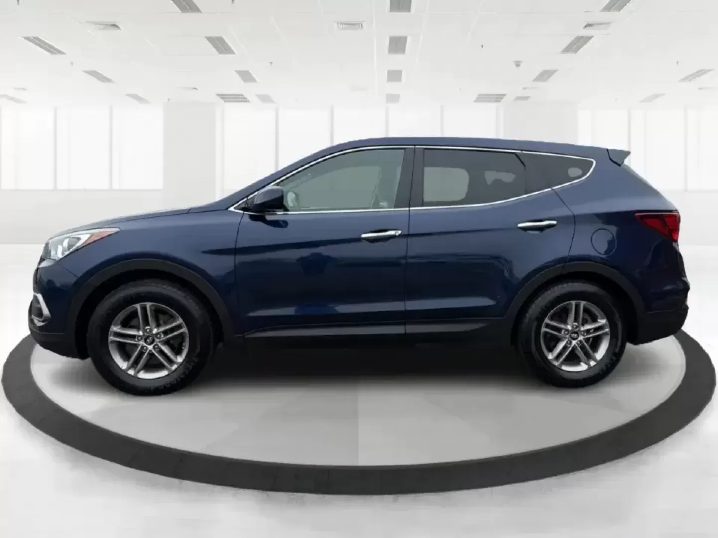 2018 Hyundai Santa Fe 2.4L (5XYZTDLB6JG) with an Theta II 2.4L I-4 gasoline direct injection engine, 6A transmission, located at 8750 N County Rd 25A, Piqua, OH, 45356, (937) 908-9800, 40.164391, -84.232513 - Road trips to Indian Lake, snowy school runs, and everyday commuting up and down I75 feel a lot easier when your SUV is roomy, confident in bad weather, and comfortable for everyone on board. This 2018 Hyundai Santa Fe 2.4L in striking Nightfall Blue is a practical, family-friendly sport utility tha - Photo#5