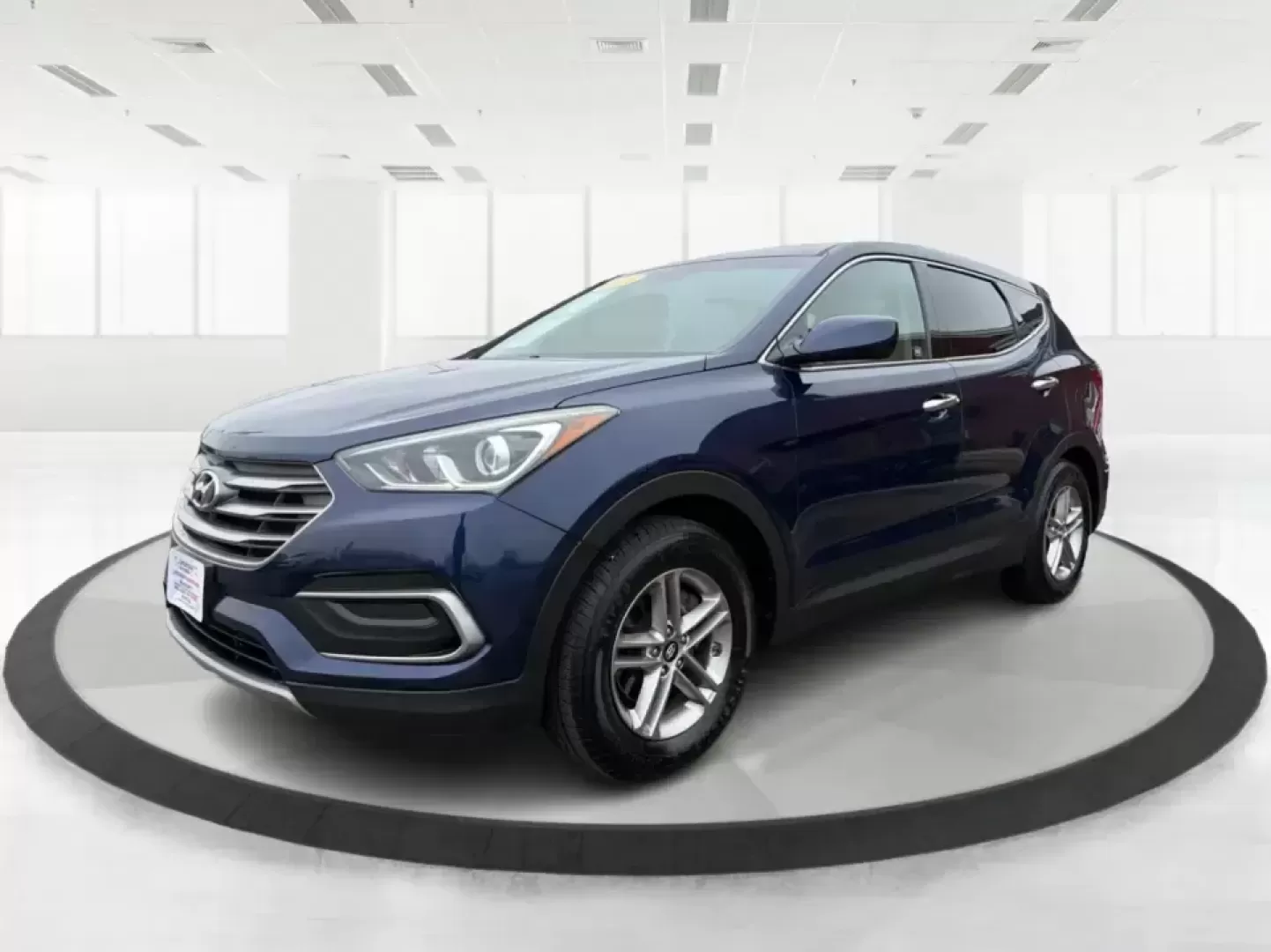 2018 Hyundai Santa Fe 2.4L (5XYZTDLB6JG) with an Theta II 2.4L I-4 gasoline direct injection engine, 6A transmission, located at 8750 N County Rd 25A, Piqua, OH, 45356, (937) 908-9800, 40.164391, -84.232513 - Road trips to Indian Lake, snowy school runs, and everyday commuting up and down I75 feel a lot easier when your SUV is roomy, confident in bad weather, and comfortable for everyone on board. This 2018 Hyundai Santa Fe 2.4L in striking Nightfall Blue is a practical, family-friendly sport utility tha - Photo#8