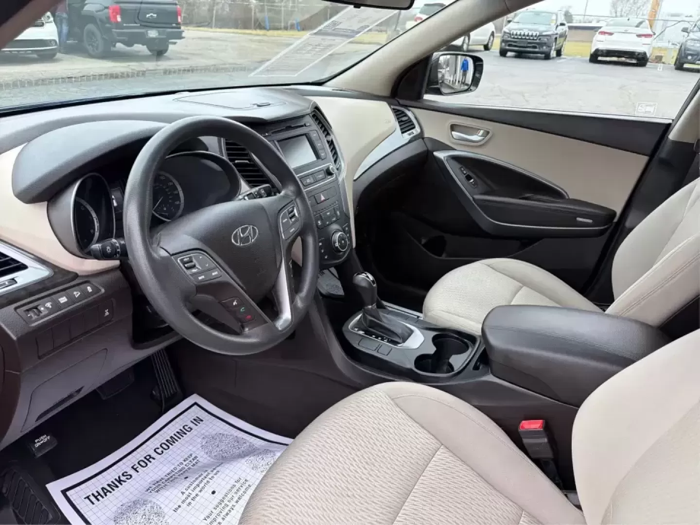 2018 Hyundai Santa Fe 2.4L (5XYZTDLB6JG) with an Theta II 2.4L I-4 gasoline direct injection engine, 6A transmission, located at 8750 N County Rd 25A, Piqua, OH, 45356, (937) 908-9800, 40.164391, -84.232513 - Road trips to Indian Lake, snowy school runs, and everyday commuting up and down I75 feel a lot easier when your SUV is roomy, confident in bad weather, and comfortable for everyone on board. This 2018 Hyundai Santa Fe 2.4L in striking Nightfall Blue is a practical, family-friendly sport utility tha - Photo#9