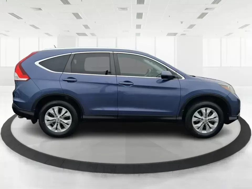 2013 Honda CR-V EX-L (2HKRM4H74DH) with an 2.4L I-4 DOHC engine, 5-Speed Automatic transmission, located at 1184 Kauffman Ave, Fairborn, OH, 45324, (937) 908-9800, 39.807072, -84.030914 - Picture your next weekend: a quick run up I75 for a Dayton Dragons game, a family trip to Treasure Island Park, or a snowy school-morning commute across Troy-without stressing about space, comfort, or traction. This 2013 Honda CRV EXL in Twilight Blue Metallic is the kind of do-it-all SUV that fits - Photo#1