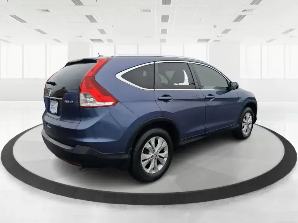 2013 Honda CR-V EX-L (2HKRM4H74DH) with an 2.4L I-4 DOHC engine, 5-Speed Automatic transmission, located at 1184 Kauffman Ave, Fairborn, OH, 45324, (937) 908-9800, 39.807072, -84.030914 - Picture your next weekend: a quick run up I75 for a Dayton Dragons game, a family trip to Treasure Island Park, or a snowy school-morning commute across Troy-without stressing about space, comfort, or traction. This 2013 Honda CRV EXL in Twilight Blue Metallic is the kind of do-it-all SUV that fits - Photo#2