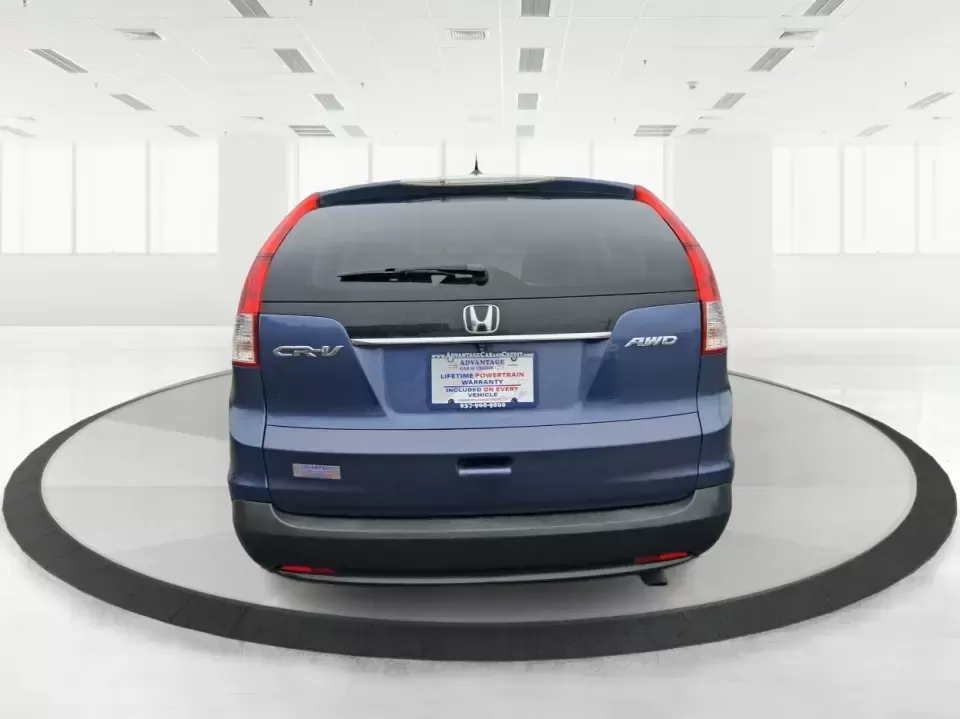 2013 Honda CR-V EX-L (2HKRM4H74DH) with an 2.4L I-4 DOHC engine, 5-Speed Automatic transmission, located at 1184 Kauffman Ave, Fairborn, OH, 45324, (937) 908-9800, 39.807072, -84.030914 - Picture your next weekend: a quick run up I75 for a Dayton Dragons game, a family trip to Treasure Island Park, or a snowy school-morning commute across Troy-without stressing about space, comfort, or traction. This 2013 Honda CRV EXL in Twilight Blue Metallic is the kind of do-it-all SUV that fits - Photo#3