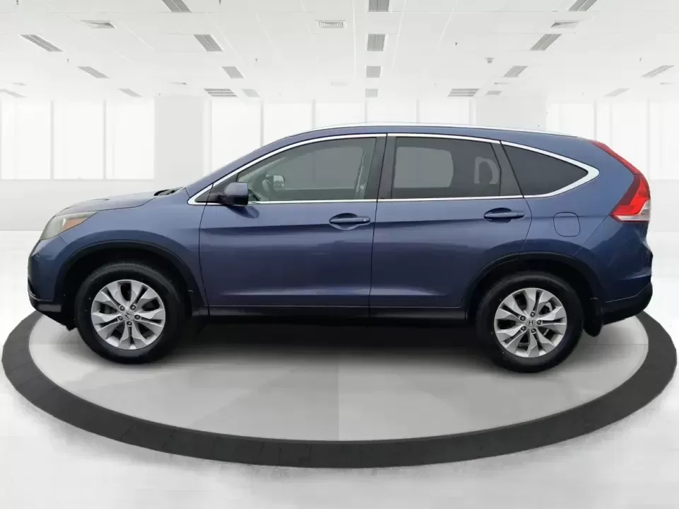 2013 Honda CR-V EX-L (2HKRM4H74DH) with an 2.4L I-4 DOHC engine, 5-Speed Automatic transmission, located at 1184 Kauffman Ave, Fairborn, OH, 45324, (937) 908-9800, 39.807072, -84.030914 - Picture your next weekend: a quick run up I75 for a Dayton Dragons game, a family trip to Treasure Island Park, or a snowy school-morning commute across Troy-without stressing about space, comfort, or traction. This 2013 Honda CRV EXL in Twilight Blue Metallic is the kind of do-it-all SUV that fits - Photo#5