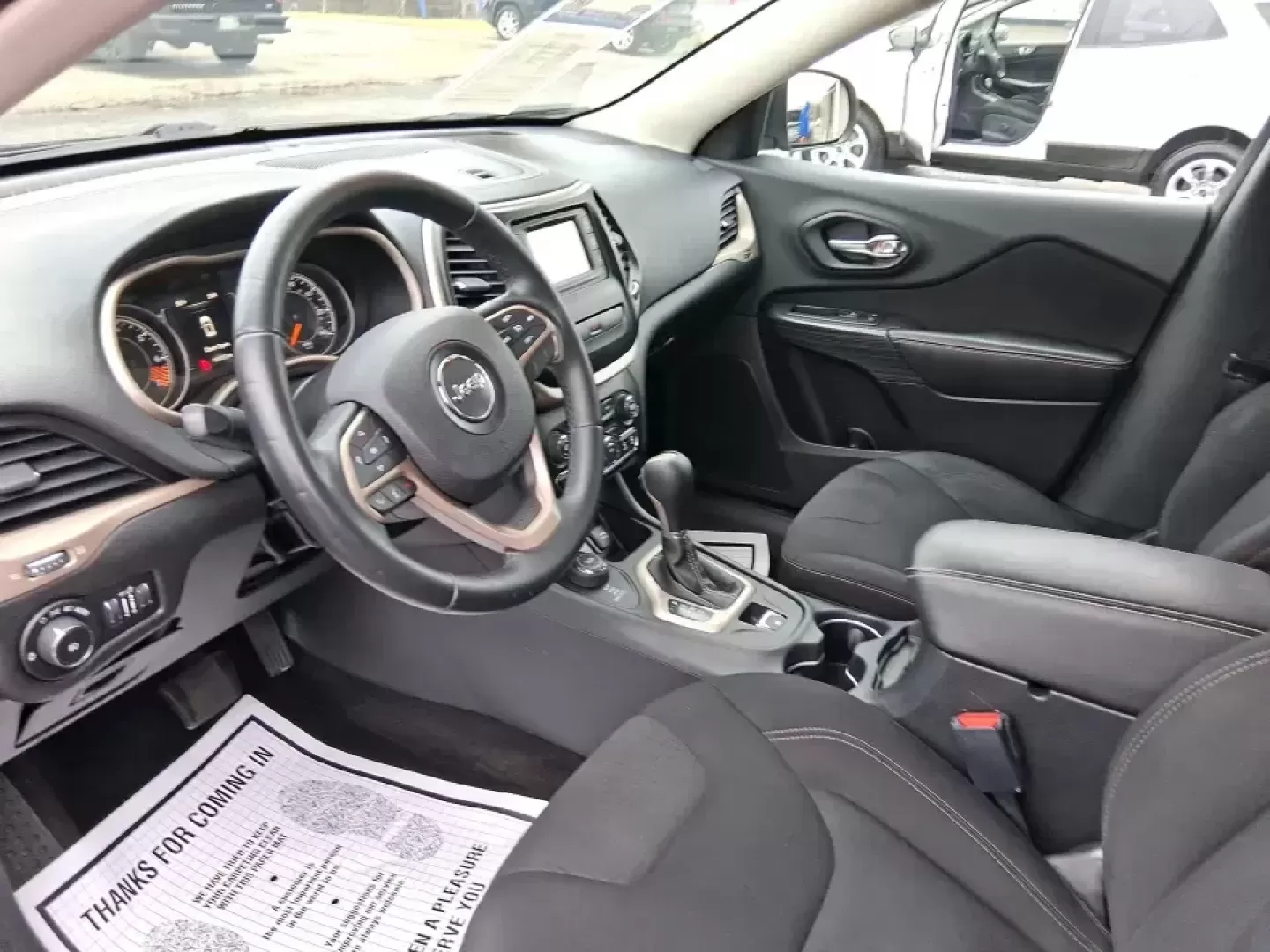 2015 Jeep Cherokee Latitude (1C4PJMCBXFW) with an 2.4L L4 DOHC 16V engine, 9-Speed Automatic transmission, located at 1230 East Main St, Xenia, OH, 45385, (937) 908-9800, 39.688026, -83.910172 - Weekend escapes to John Bryan State Park, snowy school runs, and everyday commuting up US35 feel a lot easier when you're driving a capable crossover that's comfortable, confident, and ready for Ohio weather. This 2015 Jeep Cherokee Latitude is a smart fit for busy families in Beavercreek, professio - Photo#9