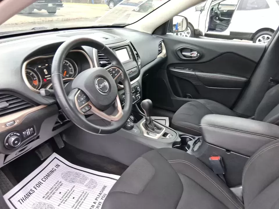 2015 Jeep Cherokee Latitude (1C4PJMCBXFW) with an 2.4L L4 DOHC 16V engine, 9-Speed Automatic transmission, located at 1230 East Main St, Xenia, OH, 45385, (937) 908-9800, 39.688026, -83.910172 - Weekend escapes to John Bryan State Park, snowy school runs, and everyday commuting up US35 feel a lot easier when you're driving a capable crossover that's comfortable, confident, and ready for Ohio weather. This 2015 Jeep Cherokee Latitude is a smart fit for busy families in Beavercreek, professio - Photo#9