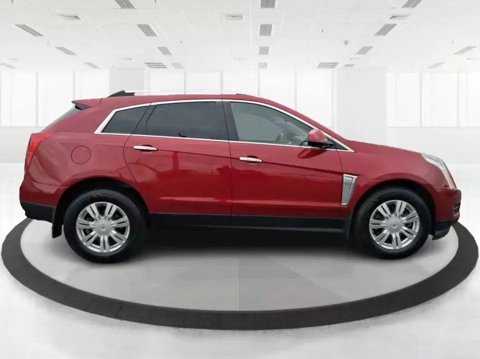 2013 Cadillac SRX Luxury Collection (3GYFNGE3XDS) with an 3.6L V-6 gasoline direct injection engine, 6-Speed Automatic transmission, located at 1230 East Main St, Xenia, OH, 45385, (937) 908-9800, 39.688026, -83.910172 - Make every day feel a little more first-class-whether you're commuting from Xenia to Beavercreek, planning a family run to the Greene County Fairgrounds, or loading up for a weekend getaway through Clifton Gorge. This 2013 Cadillac SRX Luxury Collection is the kind of SUV that fits real life: comfor - Photo#1