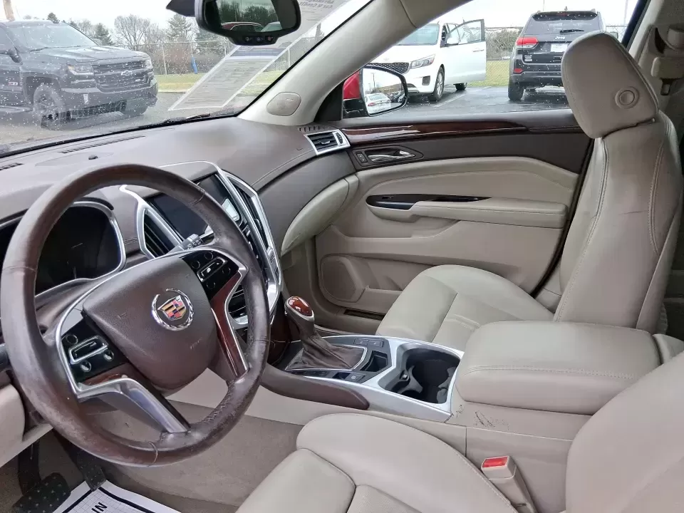 2013 Cadillac SRX Luxury Collection (3GYFNGE3XDS) with an 3.6L V-6 gasoline direct injection engine, 6-Speed Automatic transmission, located at 1230 East Main St, Xenia, OH, 45385, (937) 908-9800, 39.688026, -83.910172 - Make every day feel a little more first-class-whether you're commuting from Xenia to Beavercreek, planning a family run to the Greene County Fairgrounds, or loading up for a weekend getaway through Clifton Gorge. This 2013 Cadillac SRX Luxury Collection is the kind of SUV that fits real life: comfor - Photo#8