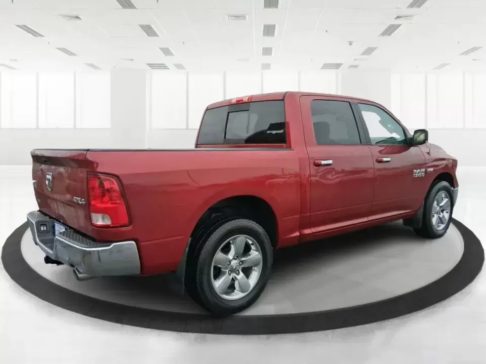 2013 Ram 1500 Big Horn (1C6RR7LT6DS) with an HEMI 5.7L V-8 variable valve control engine, 6-Speed Automatic transmission, located at 880 E. National Road, Vandalia, OH, 45377, (937) 908-9800, 39.891918, -84.183594 - Need a truck that can handle weekday work runs and still feel ready for a spontaneous weekend escape? This Flame Red Clearcoat 2013 Ram 1500 Big Horn Crew Cab is built for real-life Ohio driving-hauling, towing, commuting, and road-tripping with the comfort your passengers will appreciate and the ca - Photo#2