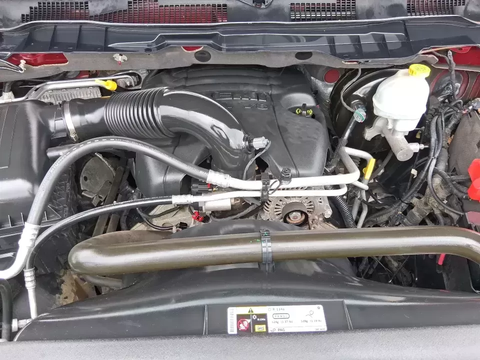 2013 Ram 1500 Big Horn (1C6RR7LT6DS) with an HEMI 5.7L V-8 variable valve control engine, 6-Speed Automatic transmission, located at 880 E. National Road, Vandalia, OH, 45377, (937) 908-9800, 39.891918, -84.183594 - Need a truck that can handle weekday work runs and still feel ready for a spontaneous weekend escape? This Flame Red Clearcoat 2013 Ram 1500 Big Horn Crew Cab is built for real-life Ohio driving-hauling, towing, commuting, and road-tripping with the comfort your passengers will appreciate and the ca - Photo#11