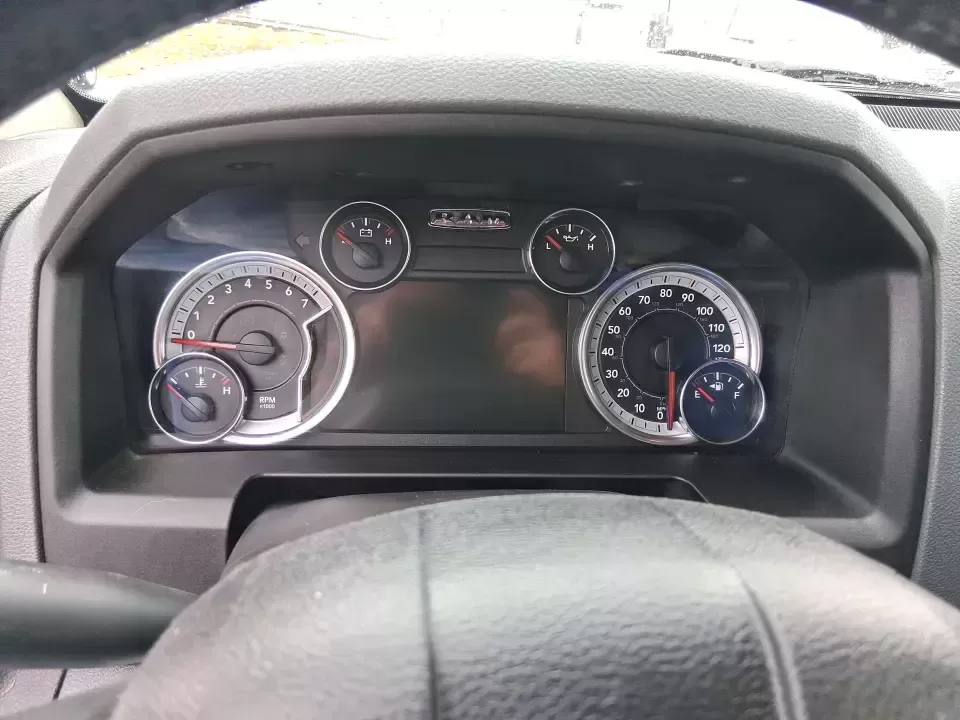 2013 Ram 1500 Big Horn (1C6RR7LT6DS) with an HEMI 5.7L V-8 variable valve control engine, 6-Speed Automatic transmission, located at 880 E. National Road, Vandalia, OH, 45377, (937) 908-9800, 39.891918, -84.183594 - Need a truck that can handle weekday work runs and still feel ready for a spontaneous weekend escape? This Flame Red Clearcoat 2013 Ram 1500 Big Horn Crew Cab is built for real-life Ohio driving-hauling, towing, commuting, and road-tripping with the comfort your passengers will appreciate and the ca - Photo#14