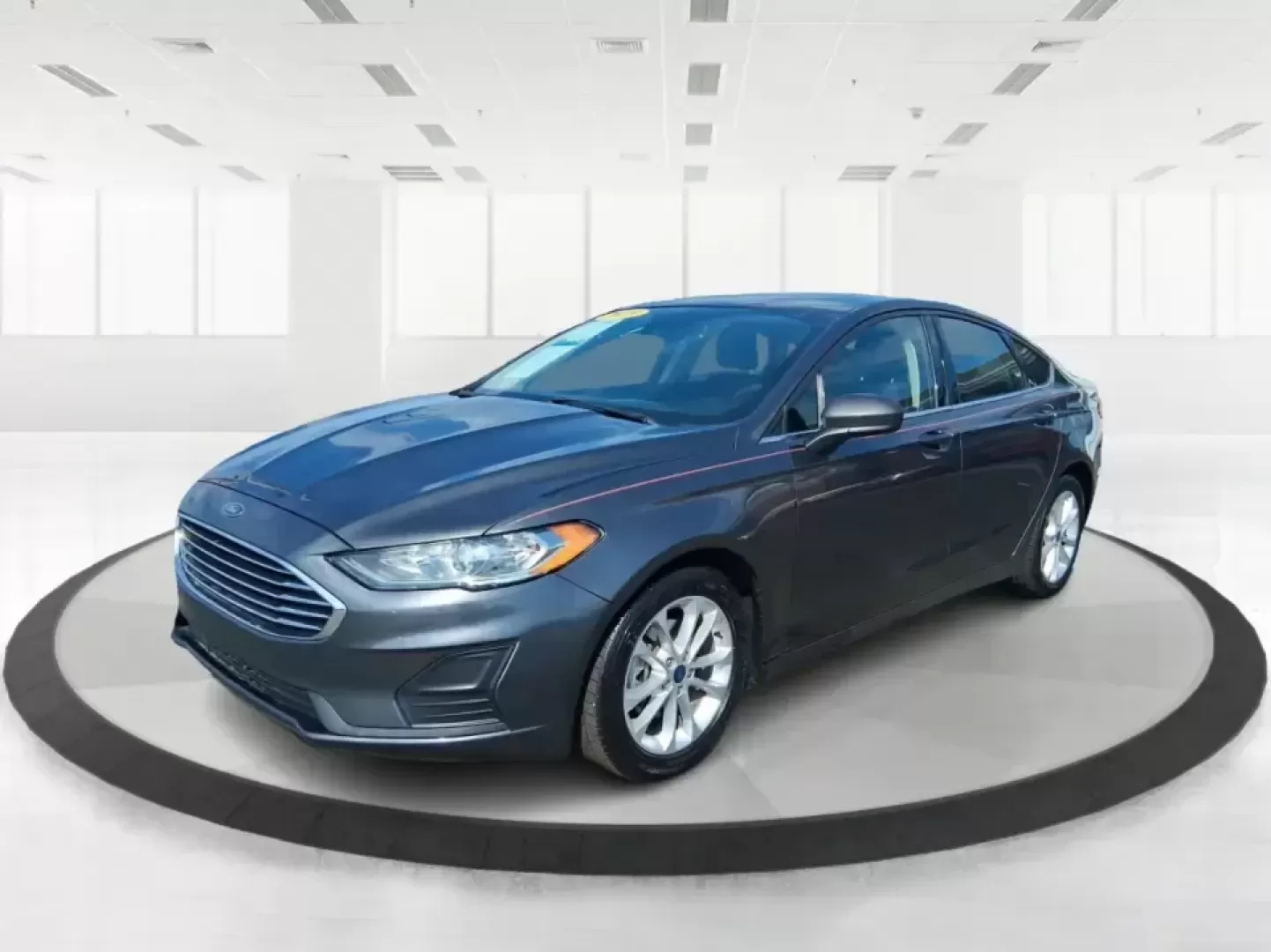 2019 Ford Fusion SE (3FA6P0H74KR) with an 2.5L L4 DOHC 16V engine, 6A transmission, located at 4508 South Dixie Dr, Moraine, OH, 45439, (937) 908-9800, 39.689976, -84.218452 - Need a reliable commuter sedan that can handle the daily grind from Riverside to Downtown Dayton, plus weekend runs to The Greene or a quick getaway to Carillon Historical Park? This 2019 Ford Fusion SE is built for real life-comfortable for long commutes, efficient on regular unleaded, and packed w - Photo#8