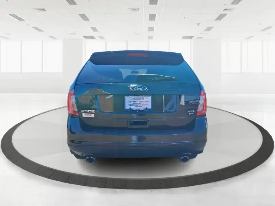 2014 Ford Edge SEL (2FMDK4JC8EB) with an 3.5L V-6 DOHC engine, 6-Speed Automatic transmission, located at 1184 Kauffman Ave, Fairborn, OH, 45324, (937) 908-9800, 39.807072, -84.030914 - Pack up the kids, load the groceries, or point the nose toward a weekend getaway-this 2014 Ford Edge SEL is the kind of SUV that fits real life in Fairborn. With confident all-weather capability and a comfortable, feature-rich cabin, it's ideal for commuters running I-675, families shuttling between - Photo#2