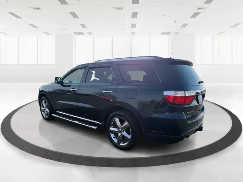 2013 Dodge Durango Citadel (1C4SDJET6DC) with an 5.7L V8 OHV 16V engine, 5-Speed Automatic transmission, located at 8750 N County Rd 25A, Piqua, OH, 45356, (937) 908-9800, 40.164391, -84.232513 - Need one SUV that can handle school drop-offs, I-75 commutes, and a loaded-up weekend trip to Indian Lake or a tailgate in Dayton-without giving up comfort or capability? This 2013 Dodge Durango Citadel in True Blue Pearlcoat is built for real-life Ohio driving, with confident 4WD/AWD traction, V8 p - Photo#4