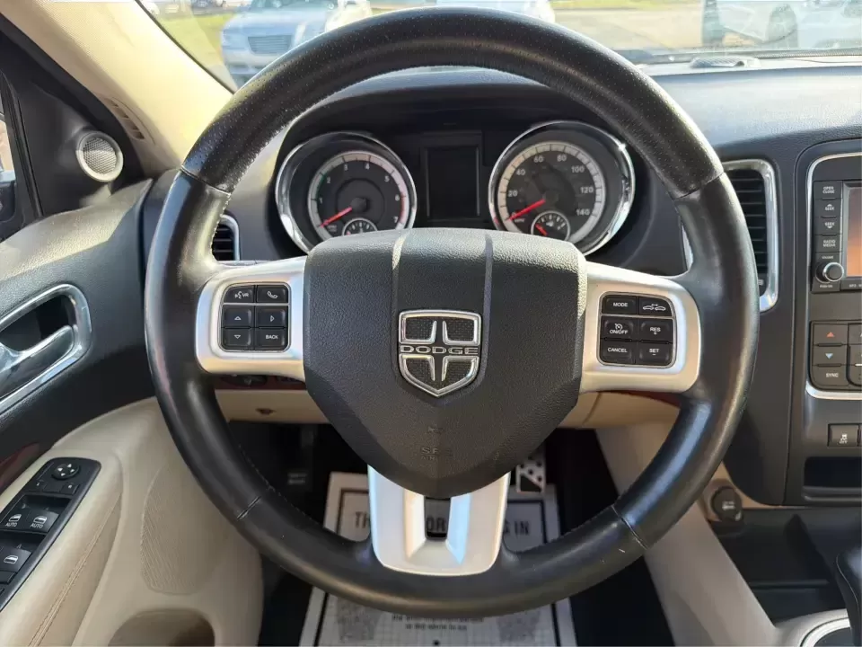 2013 Dodge Durango Citadel (1C4SDJET6DC) with an 5.7L V8 OHV 16V engine, 5-Speed Automatic transmission, located at 8750 N County Rd 25A, Piqua, OH, 45356, (937) 908-9800, 40.164391, -84.232513 - Need one SUV that can handle school drop-offs, I-75 commutes, and a loaded-up weekend trip to Indian Lake or a tailgate in Dayton-without giving up comfort or capability? This 2013 Dodge Durango Citadel in True Blue Pearlcoat is built for real-life Ohio driving, with confident 4WD/AWD traction, V8 p - Photo#16