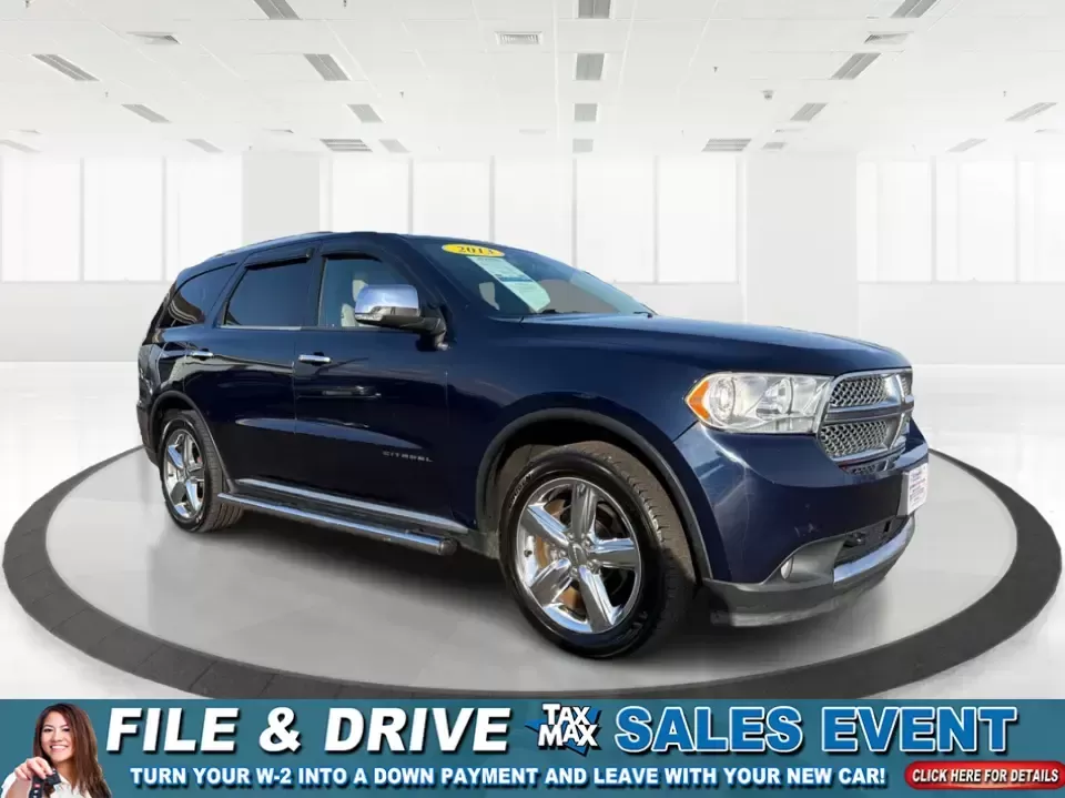 2013 Dodge Durango Citadel (1C4SDJET6DC) with an 5.7L V8 OHV 16V engine, 5-Speed Automatic transmission, located at 1951 S Dayton Lakeview Rd., New Carlisle, OH, 45344, (937) 908-9800, 39.890999, -84.050255 - Need one SUV that can handle school drop-offs, I-75 commutes, and a loaded-up weekend trip to Indian Lake or a tailgate in Dayton-without giving up comfort or capability? This 2013 Dodge Durango Citadel in True Blue Pearlcoat is built for real-life Ohio driving, with confident 4WD/AWD traction, V8 p - Photo#0