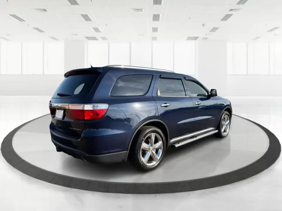 2013 Dodge Durango Citadel (1C4SDJET6DC) with an 5.7L V8 OHV 16V engine, 5-Speed Automatic transmission, located at 1951 S Dayton Lakeview Rd., New Carlisle, OH, 45344, (937) 908-9800, 39.890999, -84.050255 - Need one SUV that can handle school drop-offs, I-75 commutes, and a loaded-up weekend trip to Indian Lake or a tailgate in Dayton-without giving up comfort or capability? This 2013 Dodge Durango Citadel in True Blue Pearlcoat is built for real-life Ohio driving, with confident 4WD/AWD traction, V8 p - Photo#2