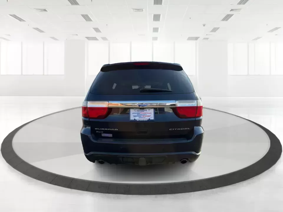 2013 Dodge Durango Citadel (1C4SDJET6DC) with an 5.7L V8 OHV 16V engine, 5-Speed Automatic transmission, located at 1951 S Dayton Lakeview Rd., New Carlisle, OH, 45344, (937) 908-9800, 39.890999, -84.050255 - Need one SUV that can handle school drop-offs, I-75 commutes, and a loaded-up weekend trip to Indian Lake or a tailgate in Dayton-without giving up comfort or capability? This 2013 Dodge Durango Citadel in True Blue Pearlcoat is built for real-life Ohio driving, with confident 4WD/AWD traction, V8 p - Photo#3