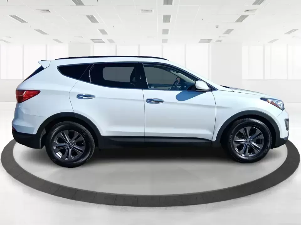 2013 Hyundai Santa Fe Sport (5XYZU3LB7DG) with an Theta II 2.4L I-4 gasoline direct injection engine, 6-Speed Automatic transmission, located at 880 E. National Road, Vandalia, OH, 45377, (937) 908-9800, 39.891918, -84.183594 - Need one SUV that can handle school drop-offs, I75 commutes, and a weekend escape to Taylorsville MetroPark without draining your budget? This 2013 Hyundai Santa Fe Sport is a smart, road-trip-ready crossover that blends everyday practicality with comfort features you'll appreciate on longer drives - Photo#1