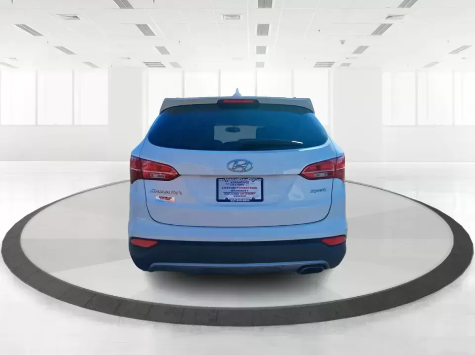 2013 Hyundai Santa Fe Sport (5XYZU3LB7DG) with an Theta II 2.4L I-4 gasoline direct injection engine, 6-Speed Automatic transmission, located at 880 E. National Road, Vandalia, OH, 45377, (937) 908-9800, 39.891918, -84.183594 - Need one SUV that can handle school drop-offs, I75 commutes, and a weekend escape to Taylorsville MetroPark without draining your budget? This 2013 Hyundai Santa Fe Sport is a smart, road-trip-ready crossover that blends everyday practicality with comfort features you'll appreciate on longer drives - Photo#3