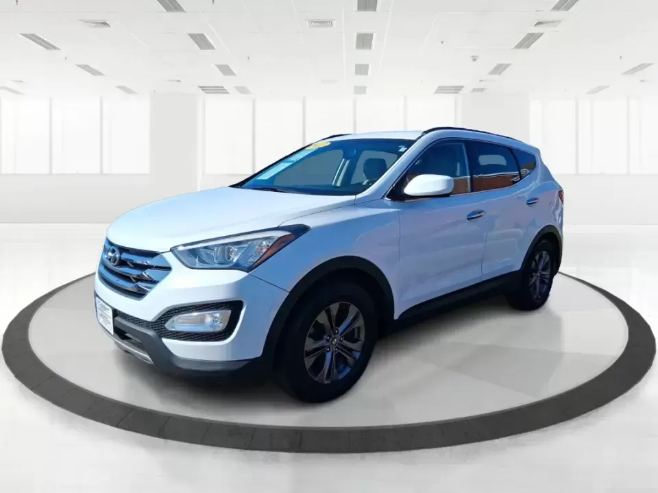 2013 Hyundai Santa Fe Sport (5XYZU3LB7DG) with an Theta II 2.4L I-4 gasoline direct injection engine, 6-Speed Automatic transmission, located at 880 E. National Road, Vandalia, OH, 45377, (937) 908-9800, 39.891918, -84.183594 - Need one SUV that can handle school drop-offs, I75 commutes, and a weekend escape to Taylorsville MetroPark without draining your budget? This 2013 Hyundai Santa Fe Sport is a smart, road-trip-ready crossover that blends everyday practicality with comfort features you'll appreciate on longer drives - Photo#8