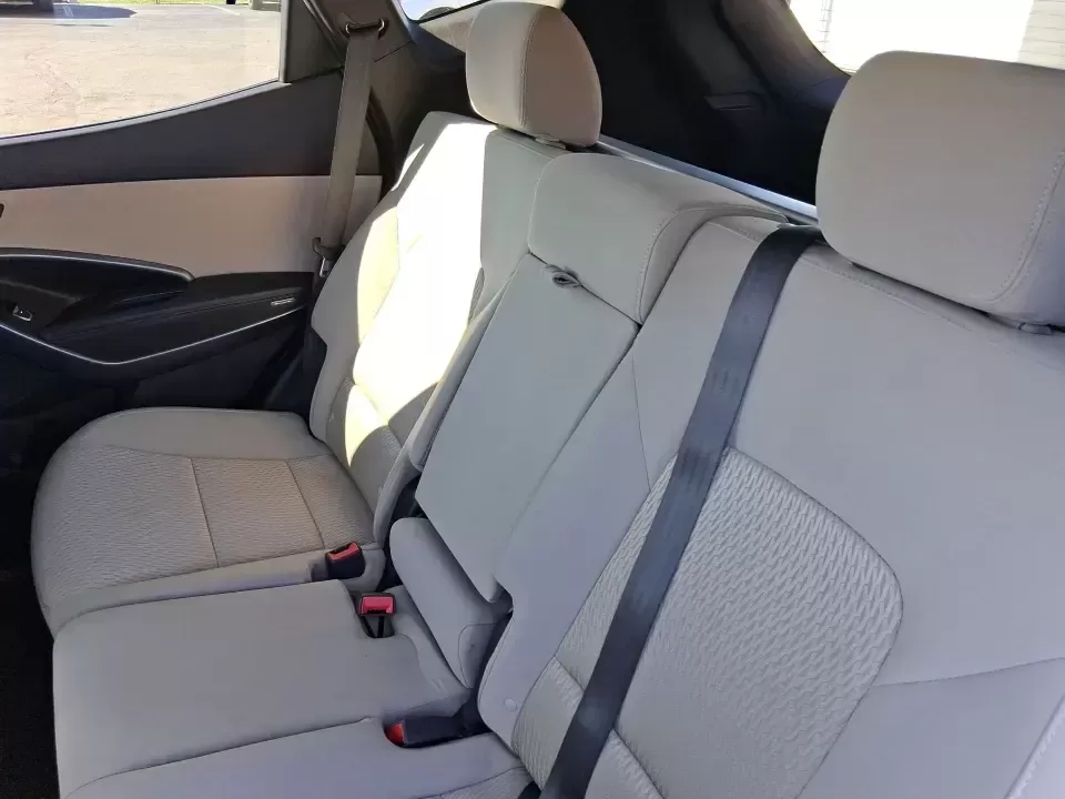 2013 Hyundai Santa Fe Sport (5XYZU3LB7DG) with an Theta II 2.4L I-4 gasoline direct injection engine, 6-Speed Automatic transmission, located at 880 E. National Road, Vandalia, OH, 45377, (937) 908-9800, 39.891918, -84.183594 - Need one SUV that can handle school drop-offs, I75 commutes, and a weekend escape to Taylorsville MetroPark without draining your budget? This 2013 Hyundai Santa Fe Sport is a smart, road-trip-ready crossover that blends everyday practicality with comfort features you'll appreciate on longer drives - Photo#10