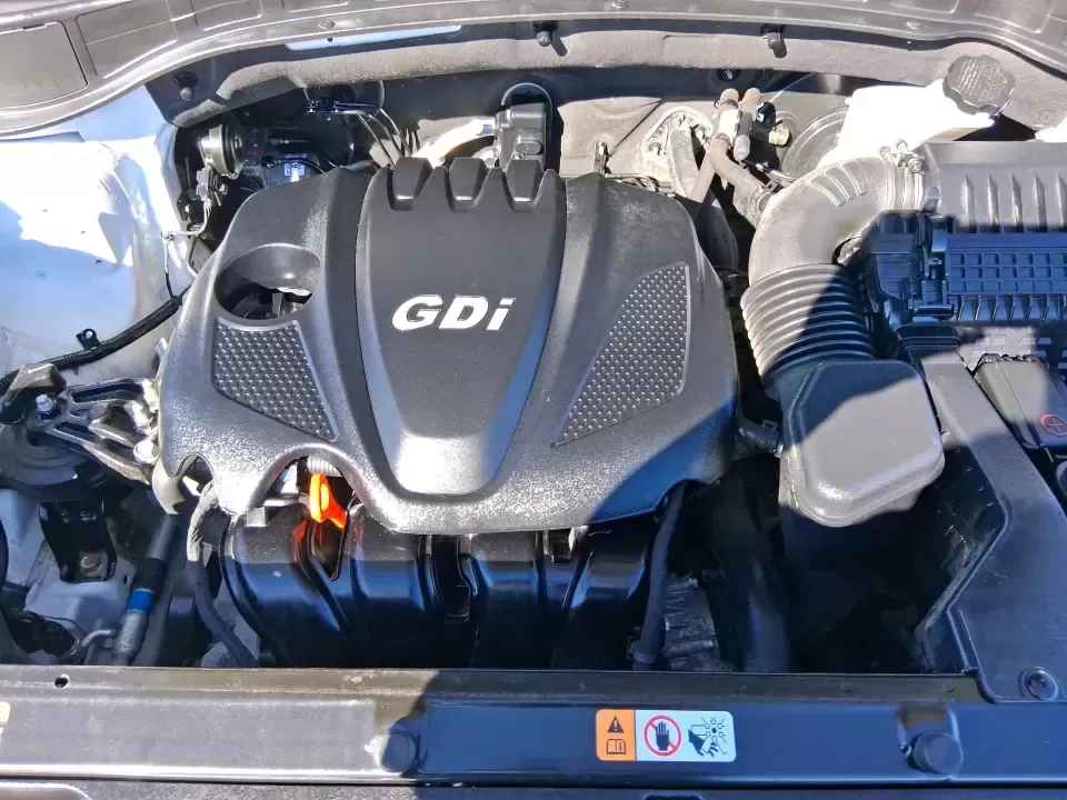 2013 Hyundai Santa Fe Sport (5XYZU3LB7DG) with an Theta II 2.4L I-4 gasoline direct injection engine, 6-Speed Automatic transmission, located at 880 E. National Road, Vandalia, OH, 45377, (937) 908-9800, 39.891918, -84.183594 - Need one SUV that can handle school drop-offs, I75 commutes, and a weekend escape to Taylorsville MetroPark without draining your budget? This 2013 Hyundai Santa Fe Sport is a smart, road-trip-ready crossover that blends everyday practicality with comfort features you'll appreciate on longer drives - Photo#11