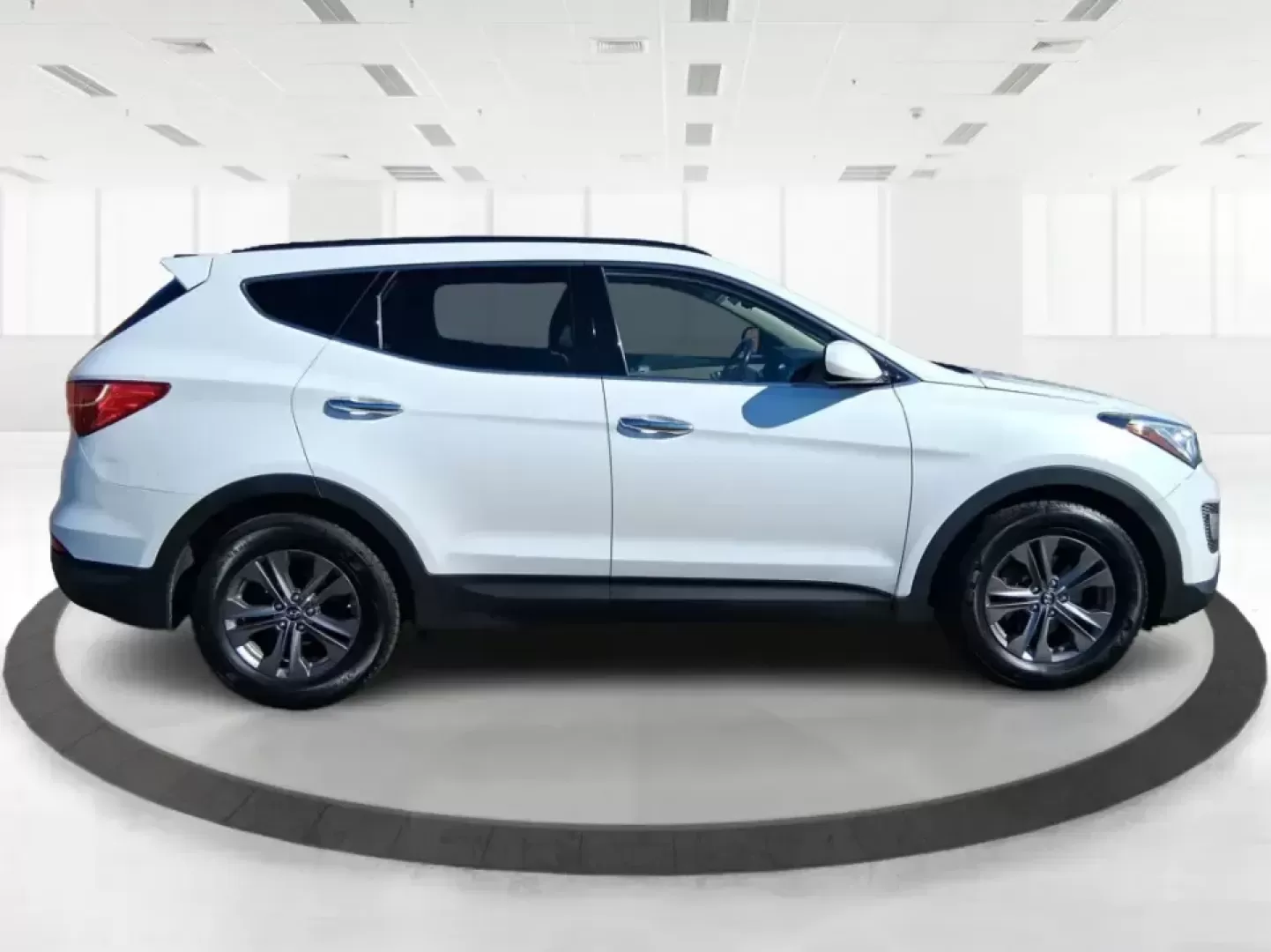 2013 Hyundai Santa Fe Sport (5XYZU3LB7DG) with an Theta II 2.4L I-4 gasoline direct injection engine, 6-Speed Automatic transmission, located at 1951 S Dayton Lakeview Rd., New Carlisle, OH, 45344, (937) 908-9800, 39.890999, -84.050255 - Need one SUV that can handle school drop-offs, I75 commutes, and a weekend escape to Taylorsville MetroPark without draining your budget? This 2013 Hyundai Santa Fe Sport is a smart, road-trip-ready crossover that blends everyday practicality with comfort features you'll appreciate on longer drives - Photo#1