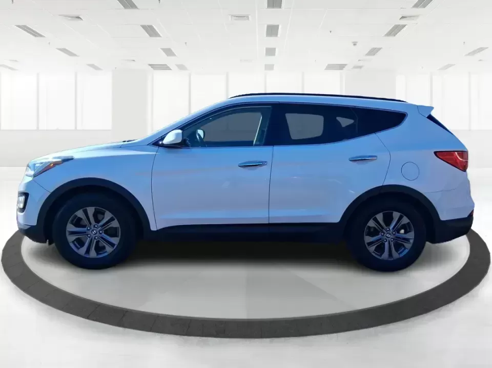 2013 Hyundai Santa Fe Sport (5XYZU3LB7DG) with an Theta II 2.4L I-4 gasoline direct injection engine, 6-Speed Automatic transmission, located at 1951 S Dayton Lakeview Rd., New Carlisle, OH, 45344, (937) 908-9800, 39.890999, -84.050255 - Need one SUV that can handle school drop-offs, I75 commutes, and a weekend escape to Taylorsville MetroPark without draining your budget? This 2013 Hyundai Santa Fe Sport is a smart, road-trip-ready crossover that blends everyday practicality with comfort features you'll appreciate on longer drives - Photo#5