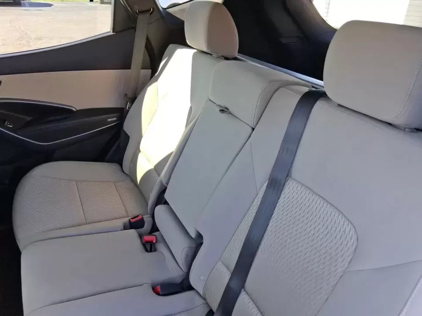 2013 Hyundai Santa Fe Sport (5XYZU3LB7DG) with an Theta II 2.4L I-4 gasoline direct injection engine, 6-Speed Automatic transmission, located at 1951 S Dayton Lakeview Rd., New Carlisle, OH, 45344, (937) 908-9800, 39.890999, -84.050255 - Need one SUV that can handle school drop-offs, I75 commutes, and a weekend escape to Taylorsville MetroPark without draining your budget? This 2013 Hyundai Santa Fe Sport is a smart, road-trip-ready crossover that blends everyday practicality with comfort features you'll appreciate on longer drives - Photo#10