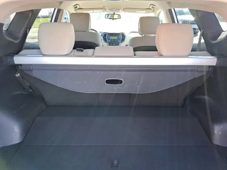 2013 Hyundai Santa Fe Sport (5XYZU3LB7DG) with an Theta II 2.4L I-4 gasoline direct injection engine, 6-Speed Automatic transmission, located at 1951 S Dayton Lakeview Rd., New Carlisle, OH, 45344, (937) 908-9800, 39.890999, -84.050255 - Need one SUV that can handle school drop-offs, I75 commutes, and a weekend escape to Taylorsville MetroPark without draining your budget? This 2013 Hyundai Santa Fe Sport is a smart, road-trip-ready crossover that blends everyday practicality with comfort features you'll appreciate on longer drives - Photo#12