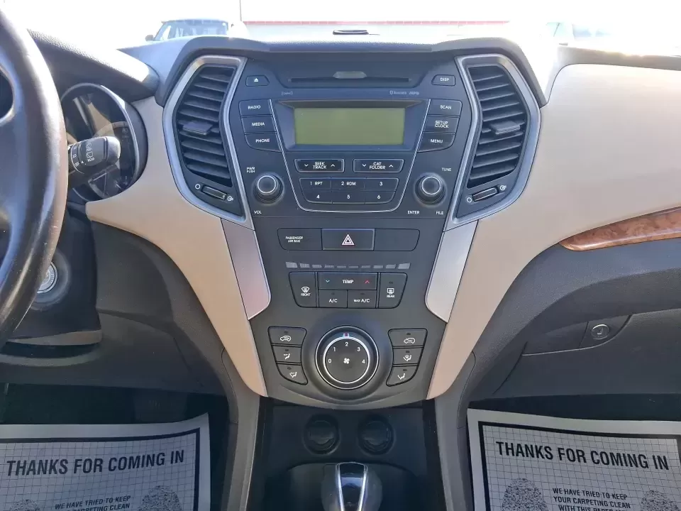 2013 Hyundai Santa Fe Sport (5XYZU3LB7DG) with an Theta II 2.4L I-4 gasoline direct injection engine, 6-Speed Automatic transmission, located at 1951 S Dayton Lakeview Rd., New Carlisle, OH, 45344, (937) 908-9800, 39.890999, -84.050255 - Need one SUV that can handle school drop-offs, I75 commutes, and a weekend escape to Taylorsville MetroPark without draining your budget? This 2013 Hyundai Santa Fe Sport is a smart, road-trip-ready crossover that blends everyday practicality with comfort features you'll appreciate on longer drives - Photo#13
