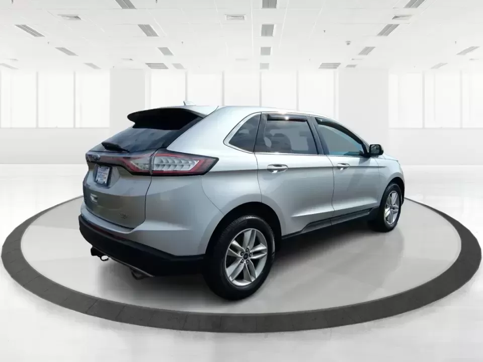 2016 Ford Edge SEL (2FMPK4J88GB) with an 3.5L V6 DOHC 24V engine, 6A transmission, located at 1099 N County Rd 25A , Troy, OH, 45373, (937) 908-9800, 40.057079, -84.212883 - Need one SUV that can handle school drop-offs, long commutes to Dayton, and spontaneous weekend getaways without feeling like a chore? This **2016 Ford Edge SEL** is built for real-life driving in and around **Xenia, Ohio**-with the comfort your family wants, the confidence you need in changing weat - Photo#2