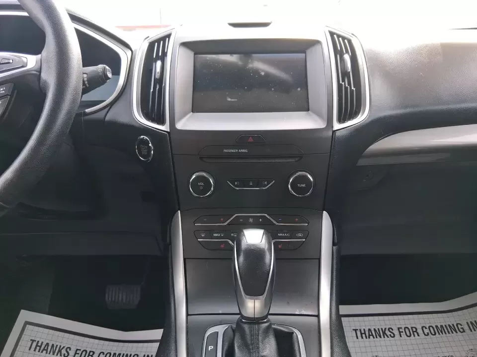 2016 Ford Edge SEL (2FMPK4J88GB) with an 3.5L V6 DOHC 24V engine, 6A transmission, located at 1099 N County Rd 25A , Troy, OH, 45373, (937) 908-9800, 40.057079, -84.212883 - Need one SUV that can handle school drop-offs, long commutes to Dayton, and spontaneous weekend getaways without feeling like a chore? This **2016 Ford Edge SEL** is built for real-life driving in and around **Xenia, Ohio**-with the comfort your family wants, the confidence you need in changing weat - Photo#13