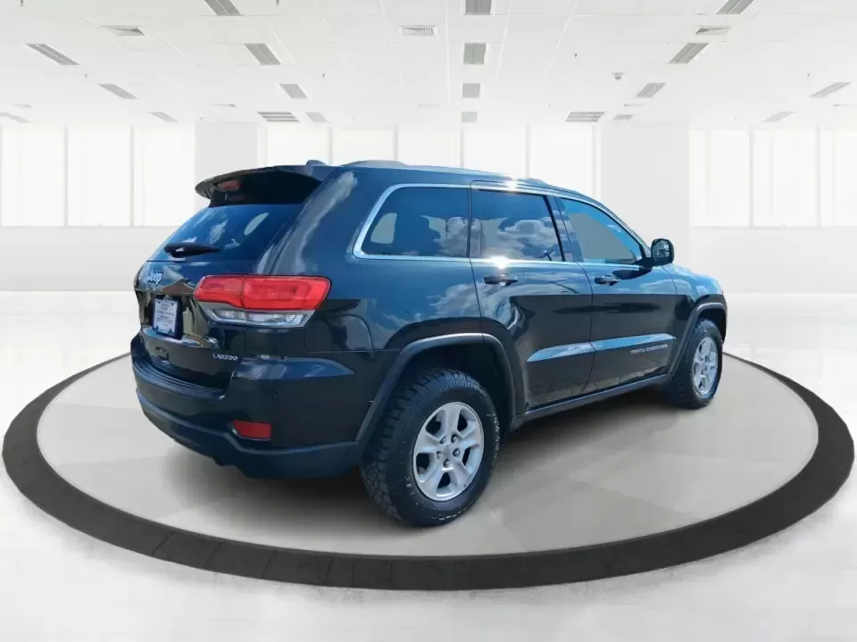 2015 Jeep Grand Cherokee Laredo (1C4RJFAG1FC) with an 3.6L V-6 DOHC engine, 8-Speed Automatic transmission, located at 8750 N County Rd 25A, Piqua, OH, 45356, (937) 908-9800, 40.164391, -84.232513 - Picture your next Ohio road trip: the family loaded up for a weekend at Indian Lake, a cooler in the back, and confidence on wet back roads or winter mornings. This 2015 Jeep Grand Cherokee Laredo is built for drivers who want everyday comfort with true SUV capability-perfect for long commutes, scho - Photo#2