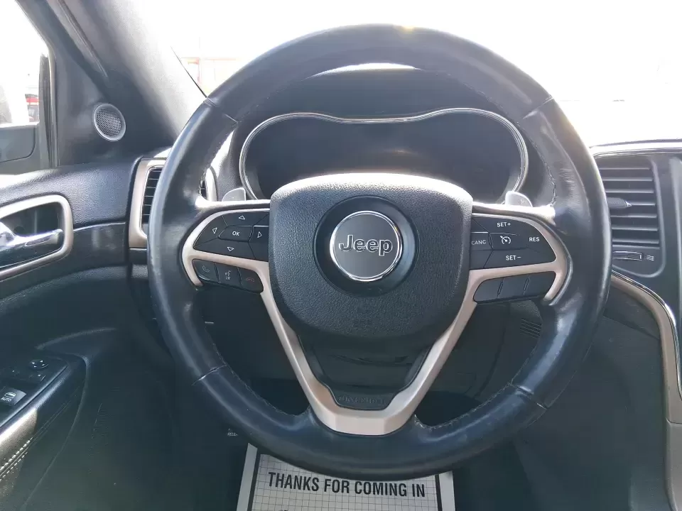 2015 Jeep Grand Cherokee Laredo (1C4RJFAG1FC) with an 3.6L V-6 DOHC engine, 8-Speed Automatic transmission, located at 8750 N County Rd 25A, Piqua, OH, 45356, (937) 908-9800, 40.164391, -84.232513 - Picture your next Ohio road trip: the family loaded up for a weekend at Indian Lake, a cooler in the back, and confidence on wet back roads or winter mornings. This 2015 Jeep Grand Cherokee Laredo is built for drivers who want everyday comfort with true SUV capability-perfect for long commutes, scho - Photo#15