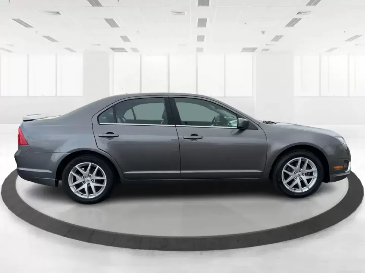 2012 Ford Fusion SEL (3FAHP0JG7CR) with an 3.0L V6 DOHC 24V engine, located at 1099 N County Rd 25A , Troy, OH, 45373, (937) 908-9800, 40.057079, -84.212883 - Need a dependable sedan that can handle the weekday commute to Dayton, quick runs up I75, and comfortable weekend drives through Miami County without draining your budget? This 2012 Ford Fusion SEL is a smart, real-world choice for drivers who want a smooth ride, confident power, and everyday practi - Photo#1