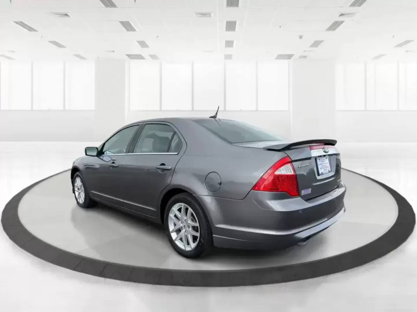 2012 Ford Fusion SEL (3FAHP0JG7CR) with an 3.0L V6 DOHC 24V engine, located at 1099 N County Rd 25A , Troy, OH, 45373, (937) 908-9800, 40.057079, -84.212883 - Need a dependable sedan that can handle the weekday commute to Dayton, quick runs up I75, and comfortable weekend drives through Miami County without draining your budget? This 2012 Ford Fusion SEL is a smart, real-world choice for drivers who want a smooth ride, confident power, and everyday practi - Photo#4